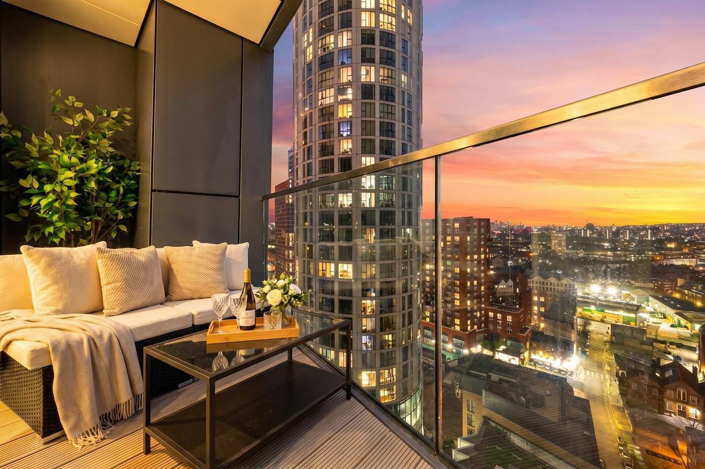 Battersea apartment living room with golden-hour London skyline view